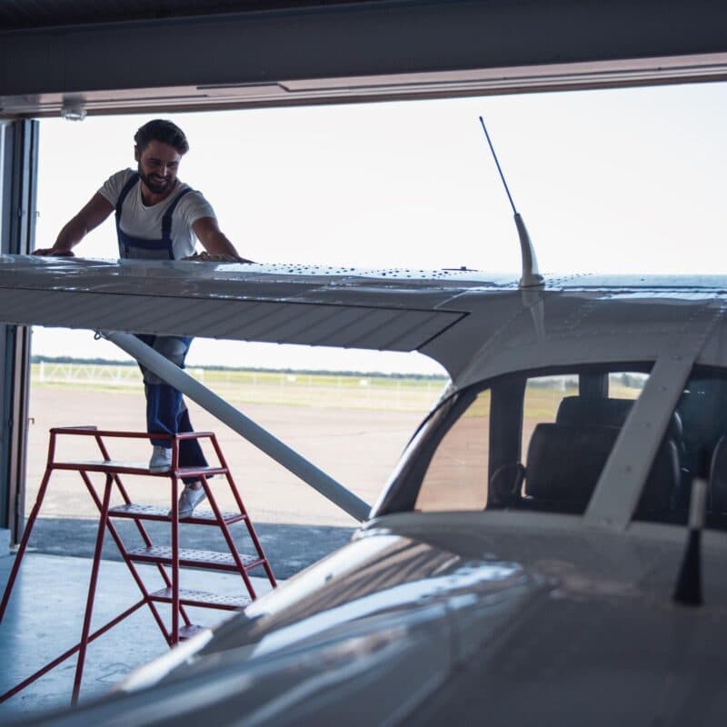 An engineer beside an aircraft