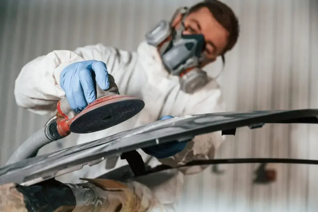 polishing the surface repairman is working with c 2024 02 28 19 11 55 utc 1