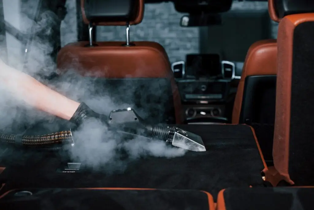 Car carpet steam cleaning and interior detailing