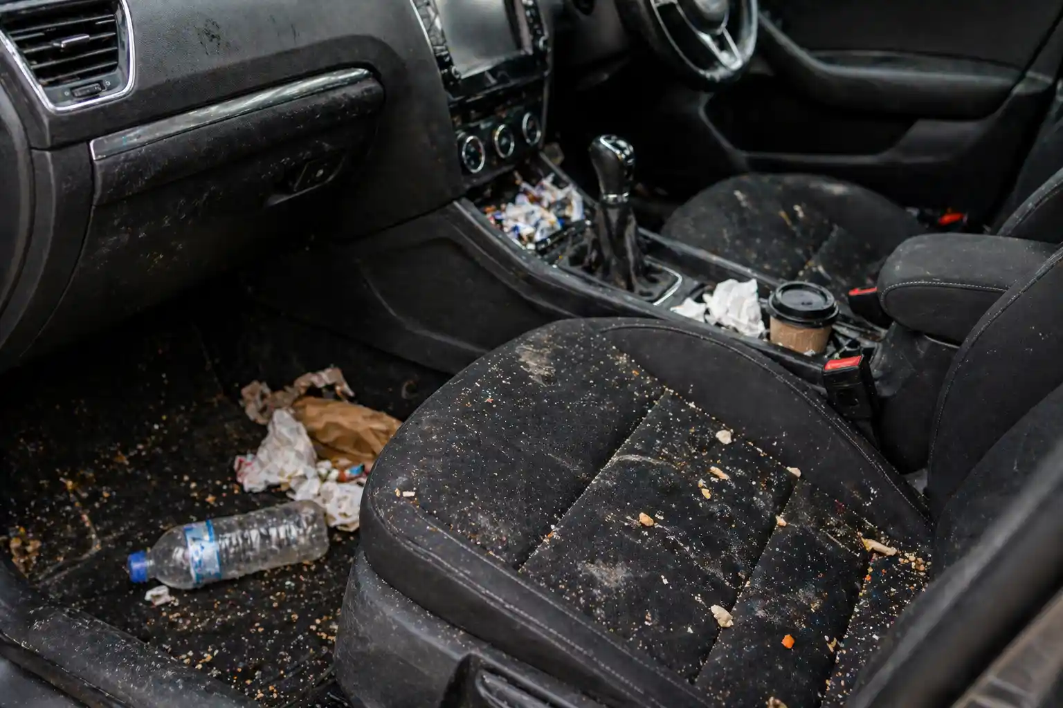 Car interior cleaning before odour treatment