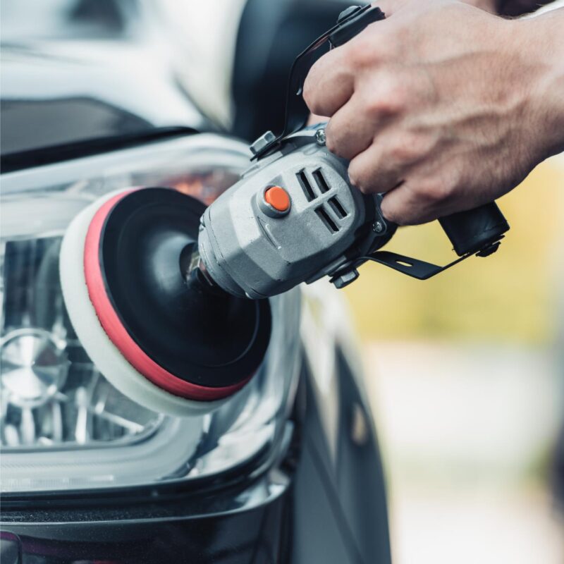 cropped view of car cleaner polishing rear lamp wi 2024 11 18 08 44 22 utc