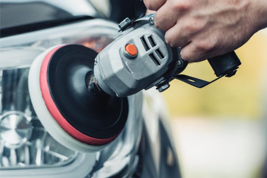cropped view of car cleaner polishing rear lamp wi 2024 11 18 08 44 22 utc